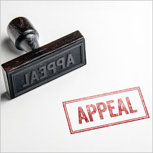 Stamp labeled 'APPEAL' with a rubber stamp symbolizing appealing a federal conviction