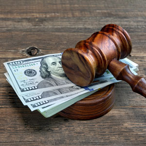 Legal penalties for missing court dates in California illustrated with gavel and money